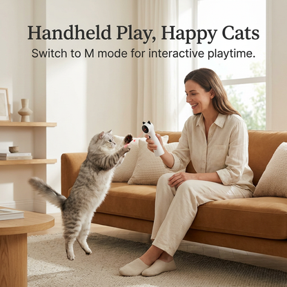 Smiling woman playing with a jumping cat, with a red dot on its paw